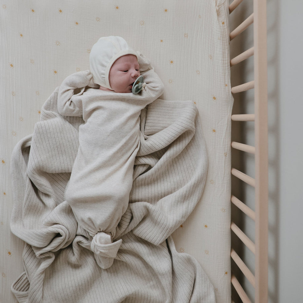 
                  
                    Knitted Ribbed Baby Blanket
                  
                